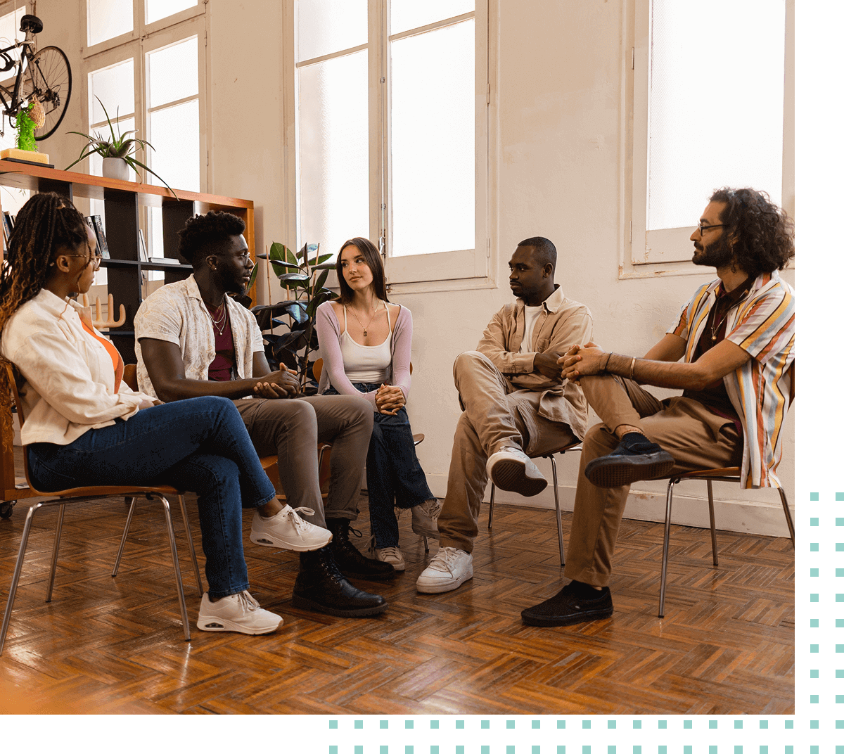 Group discussion in a bright, casual setting.