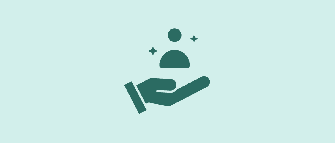 Hand supporting person icon with sparkles.